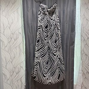 Zebra print strapless dress w/ black lining.